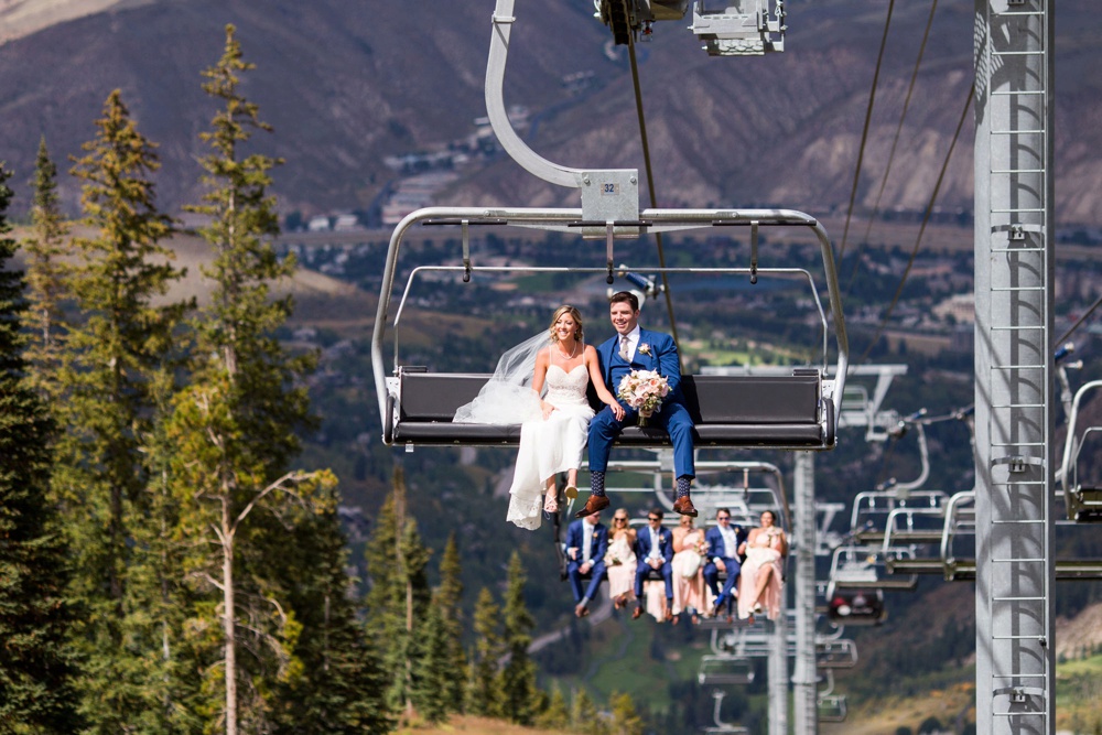 bride and groom on chairlift
